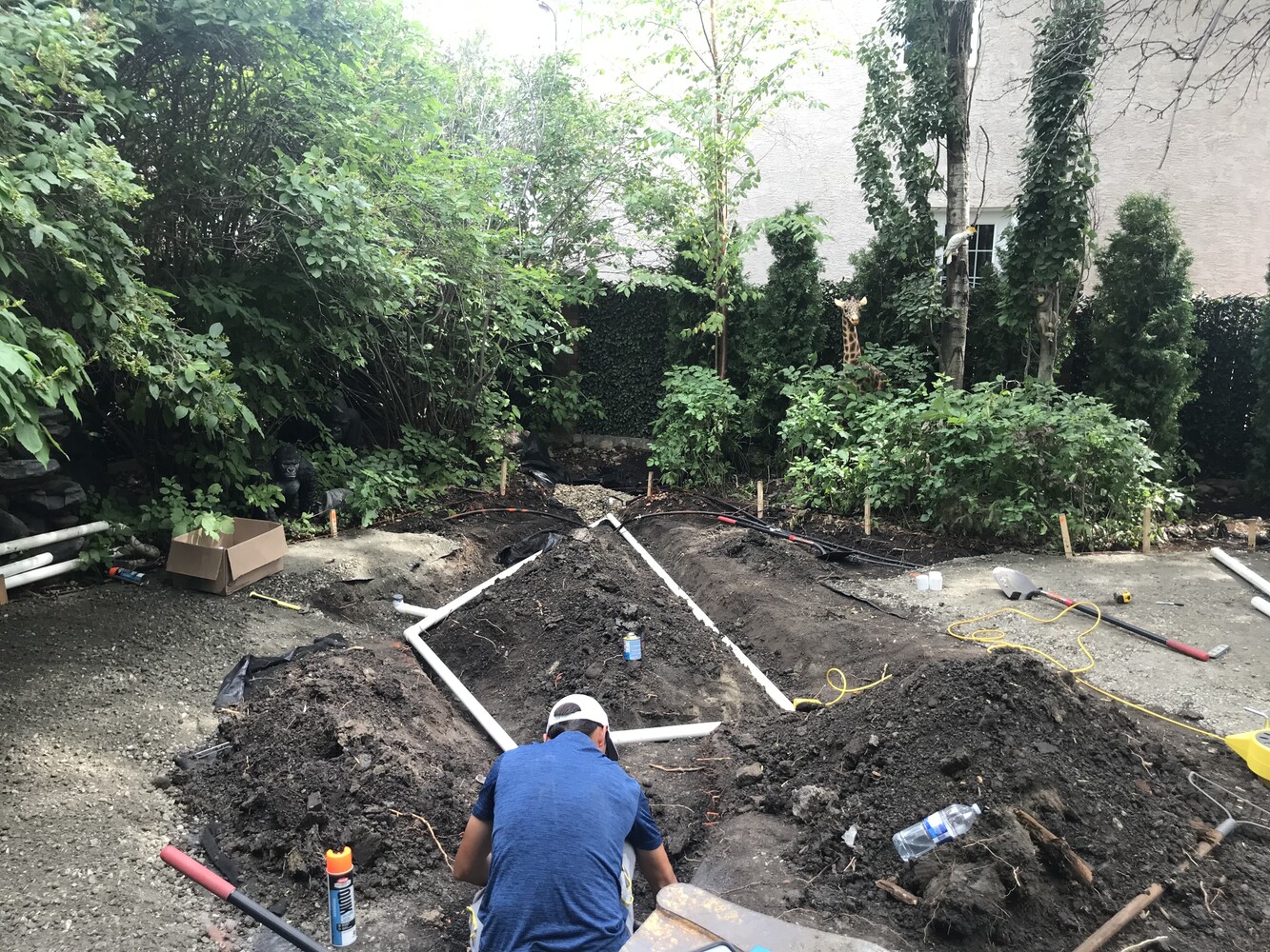 Edmonton backyard putting green gravity drain