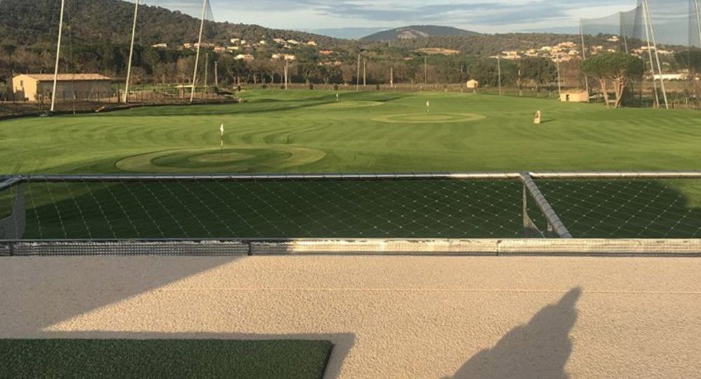 Edmonton Synthetic turf beside natural grass golf course