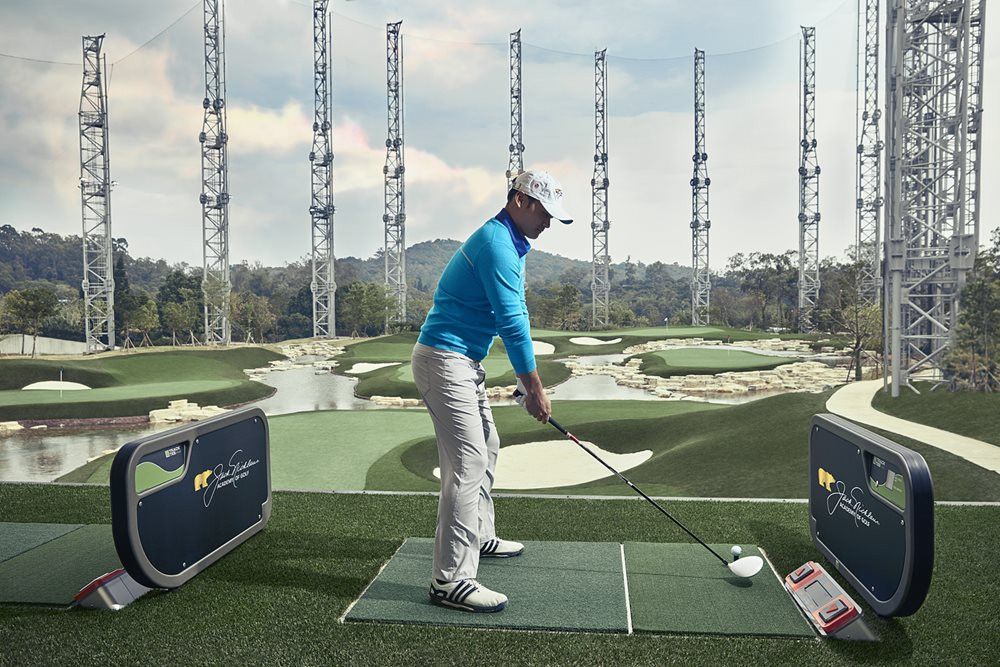 Edmonton Golfer on synthetic grass tee box